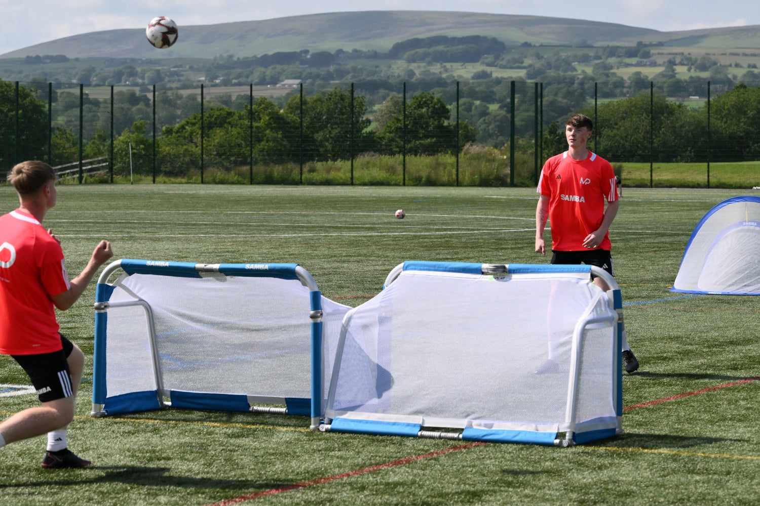 Samba 3v3 aluminium goal set up on grass for a coaching session